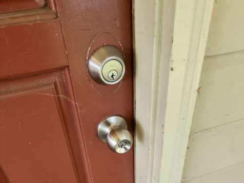 Lock changing deadbolt installation on house